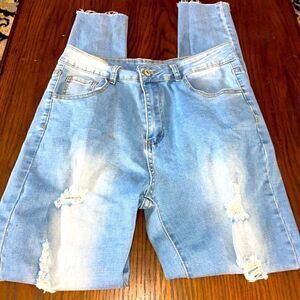 Woman’s shein distressed lightwash skinny jeans